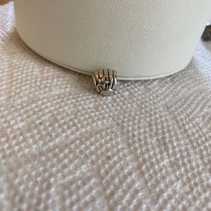 Pandora clam shell charm with a starfish on it.